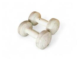 Two white dumbbells on a white background photo