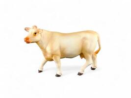 Miniature animal cow on white background photo