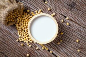 soybean on wooden background and empty space photo