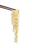 chopsticks noodles isolated on white background photo