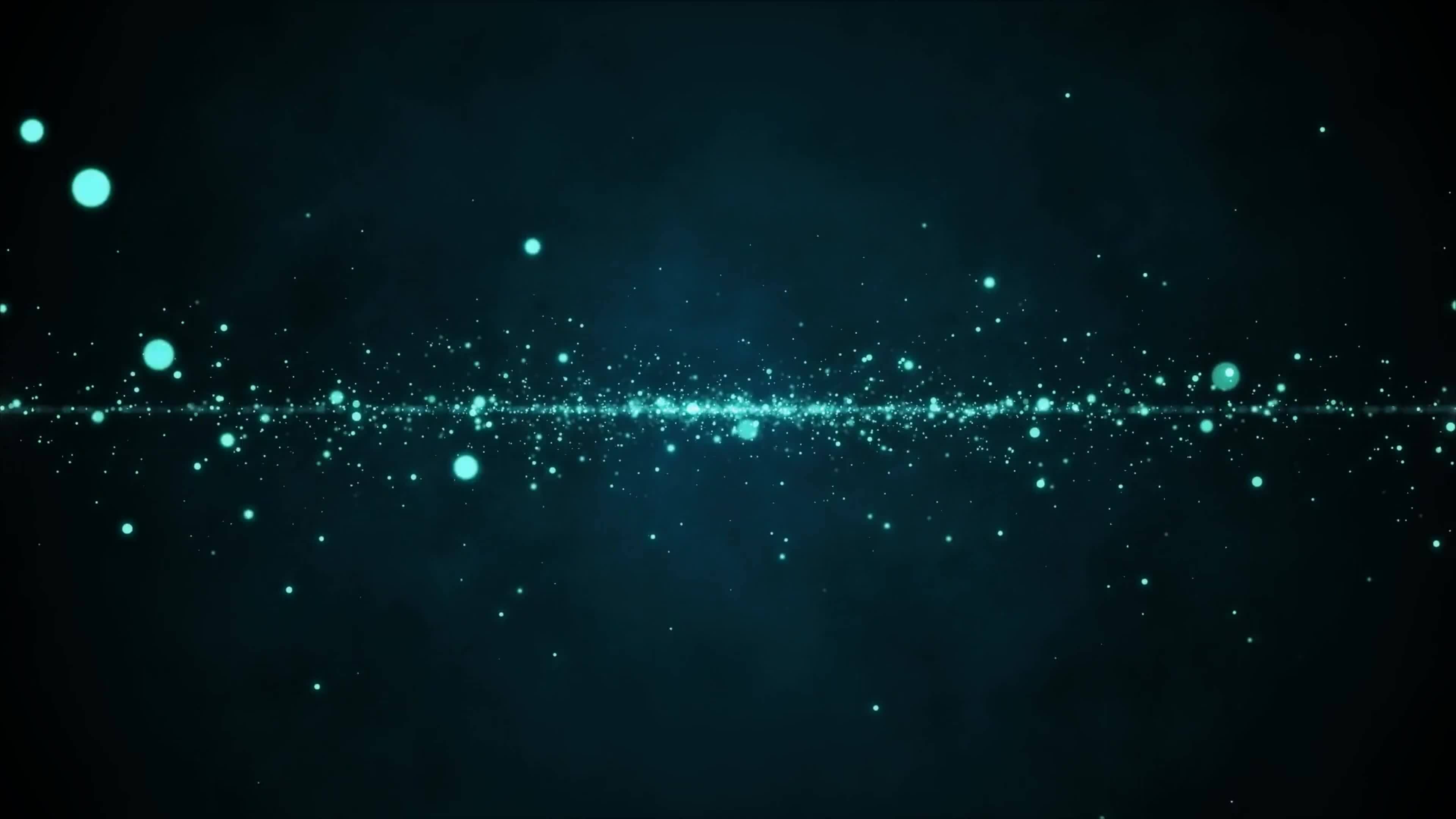 Elegant defocused green dust particles over dark background. Event game