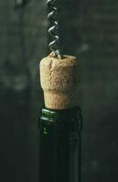 Corkscrew and bottle Background photo