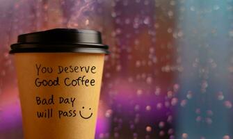 Mental Health, Comfortable and Encouragment Concept. Message on Coffee Cup to Healing Negative Mood on Bad Rainy Day photo