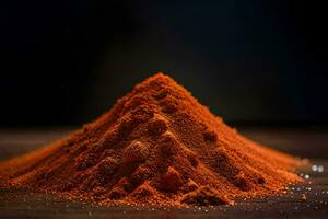 a pile of red powder on a dark background. AI-Generated photo