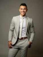 Smiling young man of Asian descent dressed in suit on gray background AI Generative photo