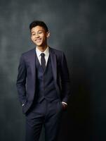 Smiling young man of Asian descent dressed in suit on gray background AI Generative photo