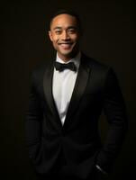 Smiling young man of Asian descent dressed in suit on gray background AI Generative photo