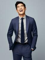 Smiling young man of Asian descent dressed in suit on gray background AI Generative photo