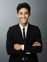 Smiling young man of Asian descent dressed in suit on gray background AI Generative photo