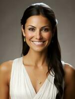 Smiling young woman of Mexican descent dressed in elegant dress on gray background AI Generative photo