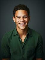 Smiling young man of Mexican descent against neutral background AI Generative photo