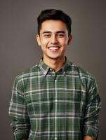 Smiling young man of Mexican descent against neutral background AI Generative photo