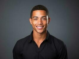 Smiling young man of Mexican descent against neutral background AI Generative photo
