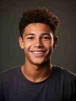 Smiling young man of Mexican descent against neutral background AI Generative photo