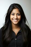 Smiling young woman of Indian descent against neutral background AI Generative photo