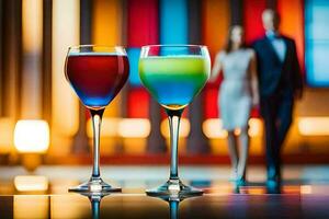 two glasses of colored drinks with a man and woman in the background. AI-Generated photo