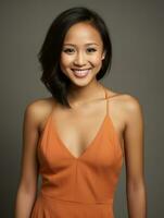 Smiling young woman of Asian descent dressed in elegant dress AI Generative photo