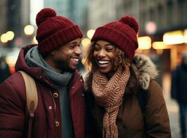 un Pareja participación manos mientras riendo y compartiendo un sombrero o gorro en invierno ciudad foto