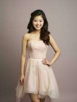 Smiling young woman of Asian descent dressed in elegant dress AI Generative photo