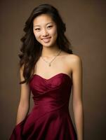 Smiling young woman of Asian descent dressed in elegant dress AI Generative photo