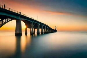 a long bridge spanning over the ocean at sunset. AI-Generated photo