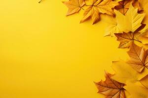 Autumn leaves on a yellow table top view. AI Generated photo