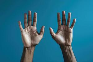 Two hands on a blue background. AI-Generated photo