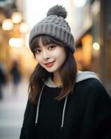 A cheerful korean girl wearing hoodie and knit hat AI Generative photo