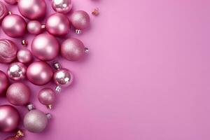 Pink Christmas balls and decorations on a pink background, with copy space. Generative Ai photo