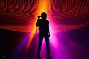 Silhouette of a singer on stage with a colorful light show in the background. Generative AI photo