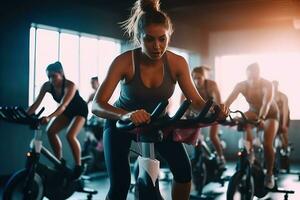 A motivational, group fitness class , featuring participants engaged in an energetic workout, such as spinning, aerobics, set against a vibrant, gym studio background. Generative AI photo