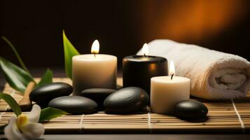 Spa Massage basalt stones with candles, lotus flowers, orchid flower and towels on bamboo mat. Generative AI. photo