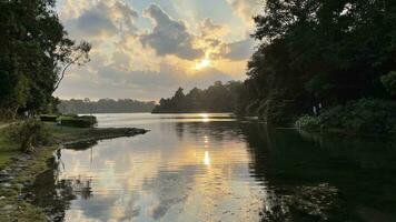 Reflections of Morning panorama of lake in the Lake District in Singapore resovoir photo