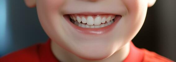 Close up of a little boy smiling with clean teeth.Health concept.Created with Generative AI technology. photo