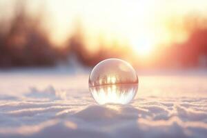 Christmas bauble glass ball on snow.Merry Christmas and Happy new year concept. photo