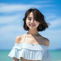 hermosa asiático niña disfrutando verano en el playa ai generativo foto