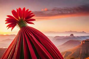 a red flower stands in front of a mountain range. AI-Generated photo