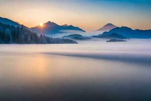 the sun rises over a mountain range and foggy lake. AI-Generated photo