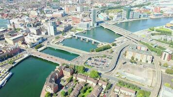 Aerial view on river and buildings in City centre of Belfast Northern Ireland. Drone photo, high angle view of town video