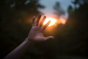 A person's hand holding a fading candle. Generative AI photo