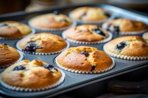 Banana Blueberry Muffins in Tray. Generative AI photo