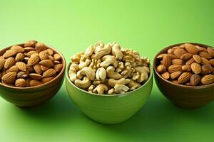 A ceramic bowl filled with nuts on a green background, nutritious AI Generated photo