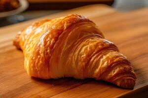 a croissant on a wooden cutting board AI Generated photo