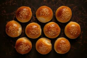 a circle of buns with sesame seeds on top photo