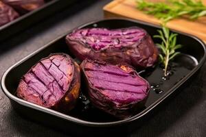 roasted fresh purple sweet potato professional advertising food photography ai generated photo