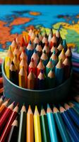 Diverse hues of color pencils encircle a vibrant and colorful globe Vertical Mobile Wallpaper AI Generated photo