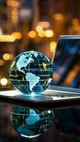 A glass globe on a laptop symbolizes a global business perspective Vertical Mobile Wallpaper AI Generated photo