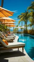 Lounge chairs encircle the pool, shaded by vibrant umbrellas for ultimate relaxation Vertical Mobile Wallpaper AI Generated photo