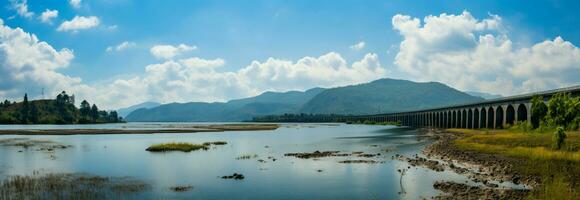 Scenic beauty panoramic vista of a stunning dam, mountains, and blue sky AI Generated photo