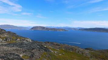 Scenic views Greenland glacier lakes and mountains near Qaqortoq close to icebergs and glaciers photo